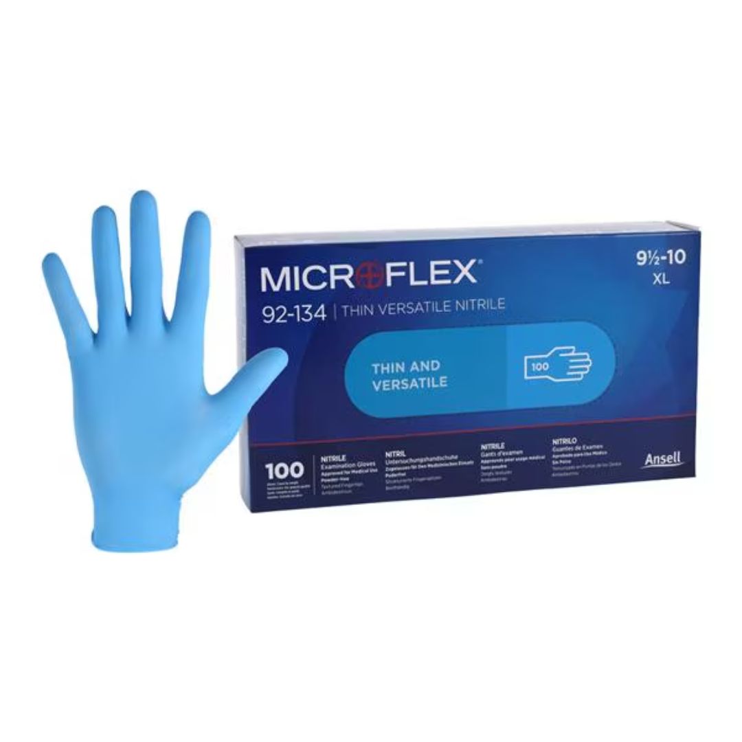 Microflex 92-134 Nitrile Exam Gloves, light blue, made from soft and stretchy nitrile, latex-free, with textured fingertips for secure grip.