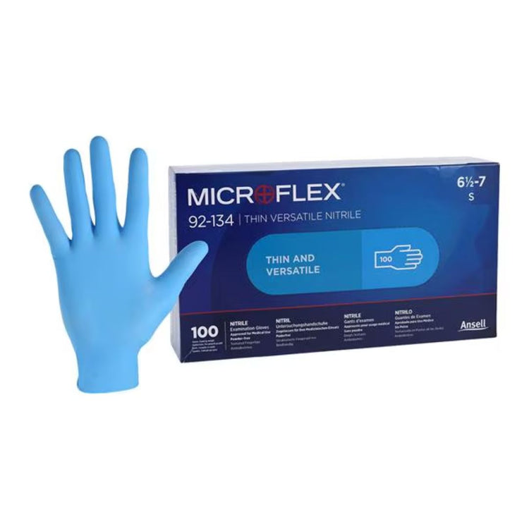 Microflex 92-134 Nitrile Exam Gloves, light blue, made from soft and stretchy nitrile, latex-free, with textured fingertips for secure grip.