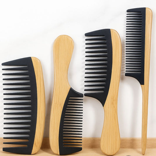 Set of four combs with black and wooden handles on a white background