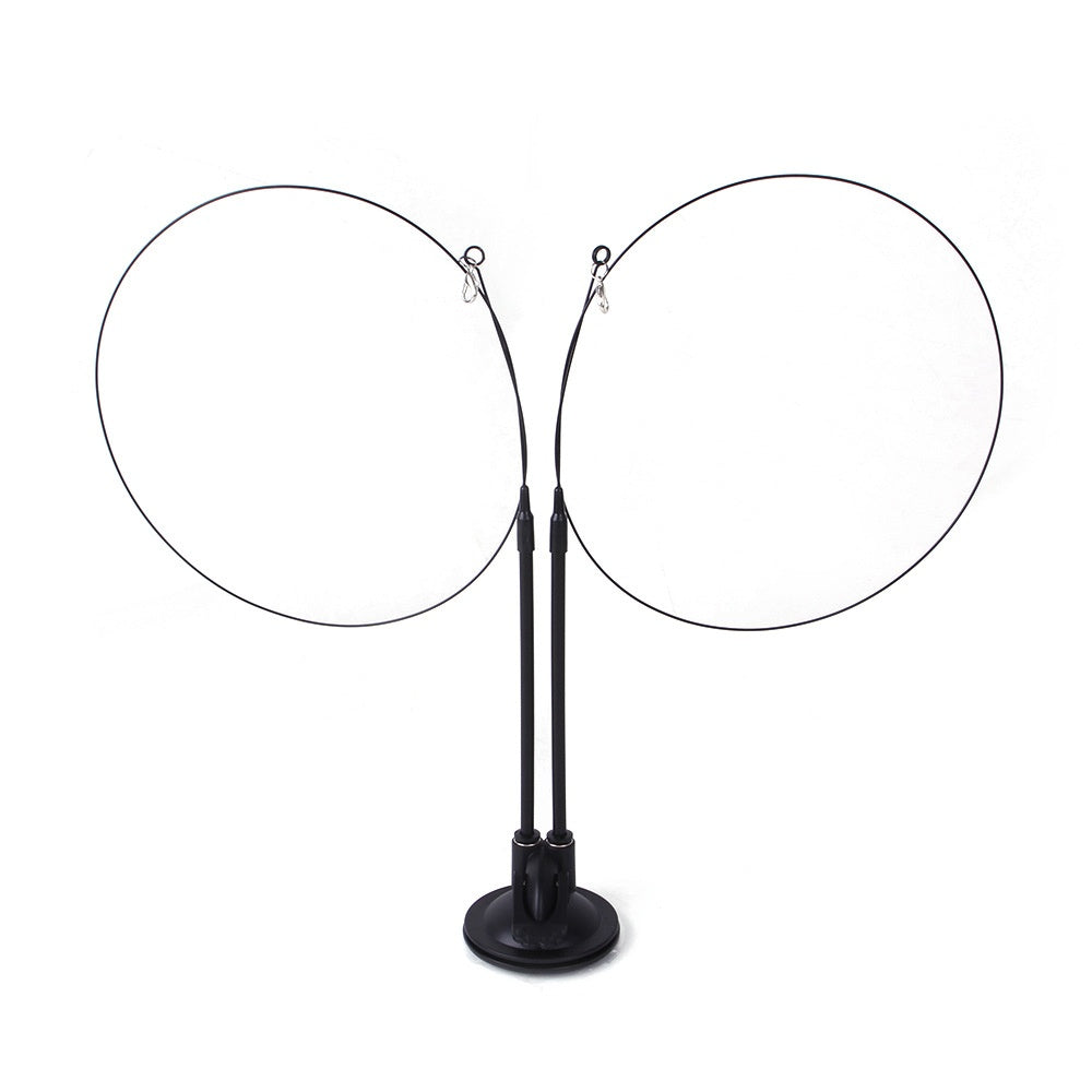 Two circular nets on stands against a white background